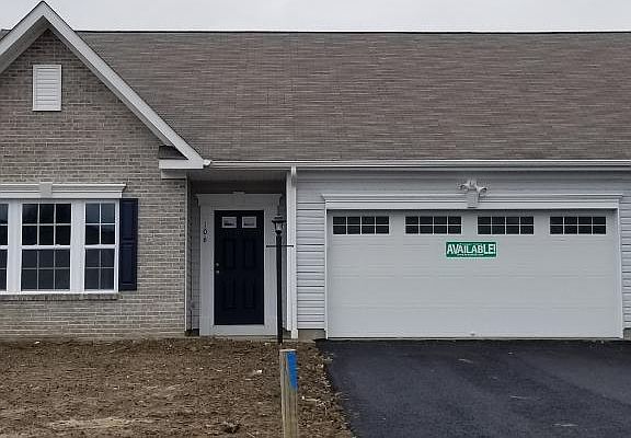 Exterior front with brick accent