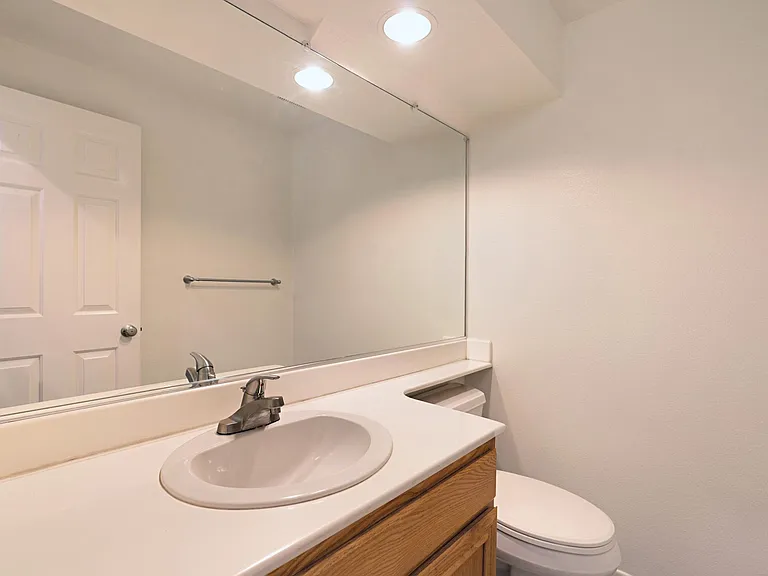 1/2 bath on main level for convenience and guests.