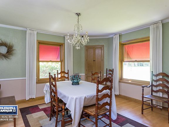 Formal Dining with Built-ins and Hardwood Floors