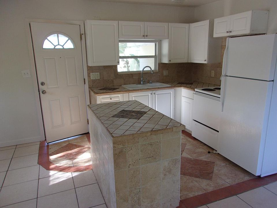 designer tile kitchen island, tile counters