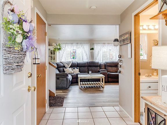 Beautiful open Entry Way with closet and half bath.  