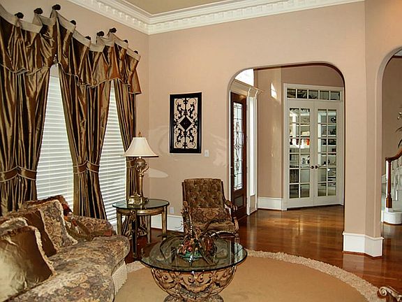There is great attention to detail with extensive moldings and six inch base throughout this magnificent home.