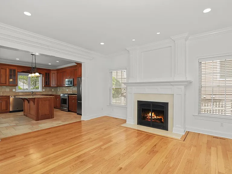 Living Room w/Fireplace Flows into Eat-in Kitchen/Dining Area