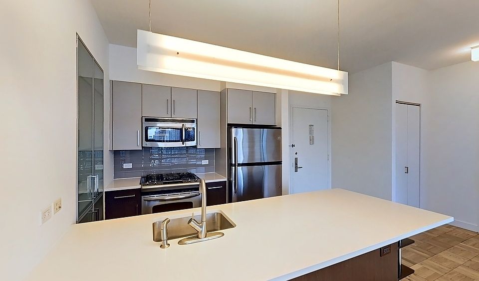 1st image of 312 11th Ave APT 27G