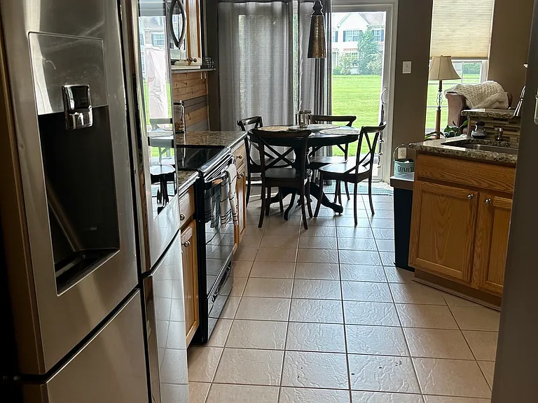 Kitchen eating area and sliders to patio