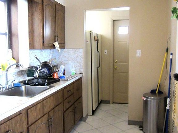 kitchen with access to Porch