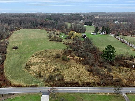 3.77 Acresbordered in back by snowmobile trail