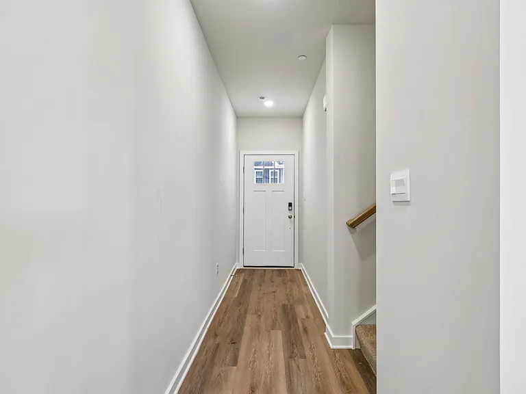 First Floor - Mohawk LVP Flooring and 9 ft ceilings with LED lighting