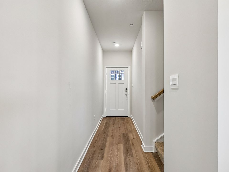 First Floor - Mohawk LVP Flooring and 9 ft ceilings with LED lighting