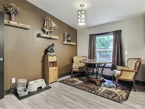 Dining area, master bedroom door on left. Split bedroom design - master is on one side of the home, the rest of the bedrooms are on the other. 