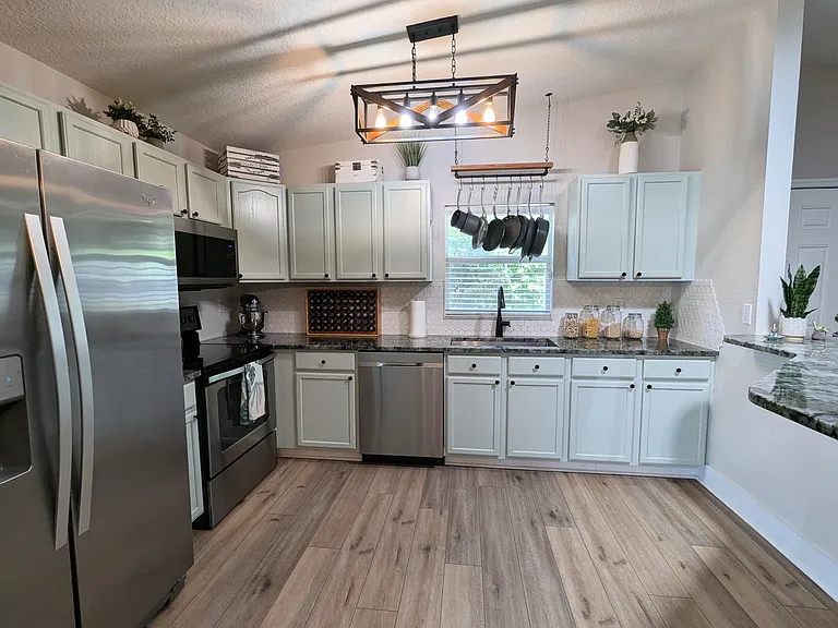 Beautifully Remodeled Open Concept Kitchen with TONS of Storage & Modern Finishes