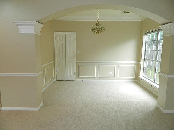 Formal Living Connects to Dining Room, Notice Beautiful Archway