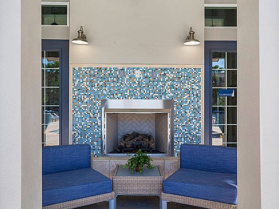 Cozy up at our Outdoor Fireplace