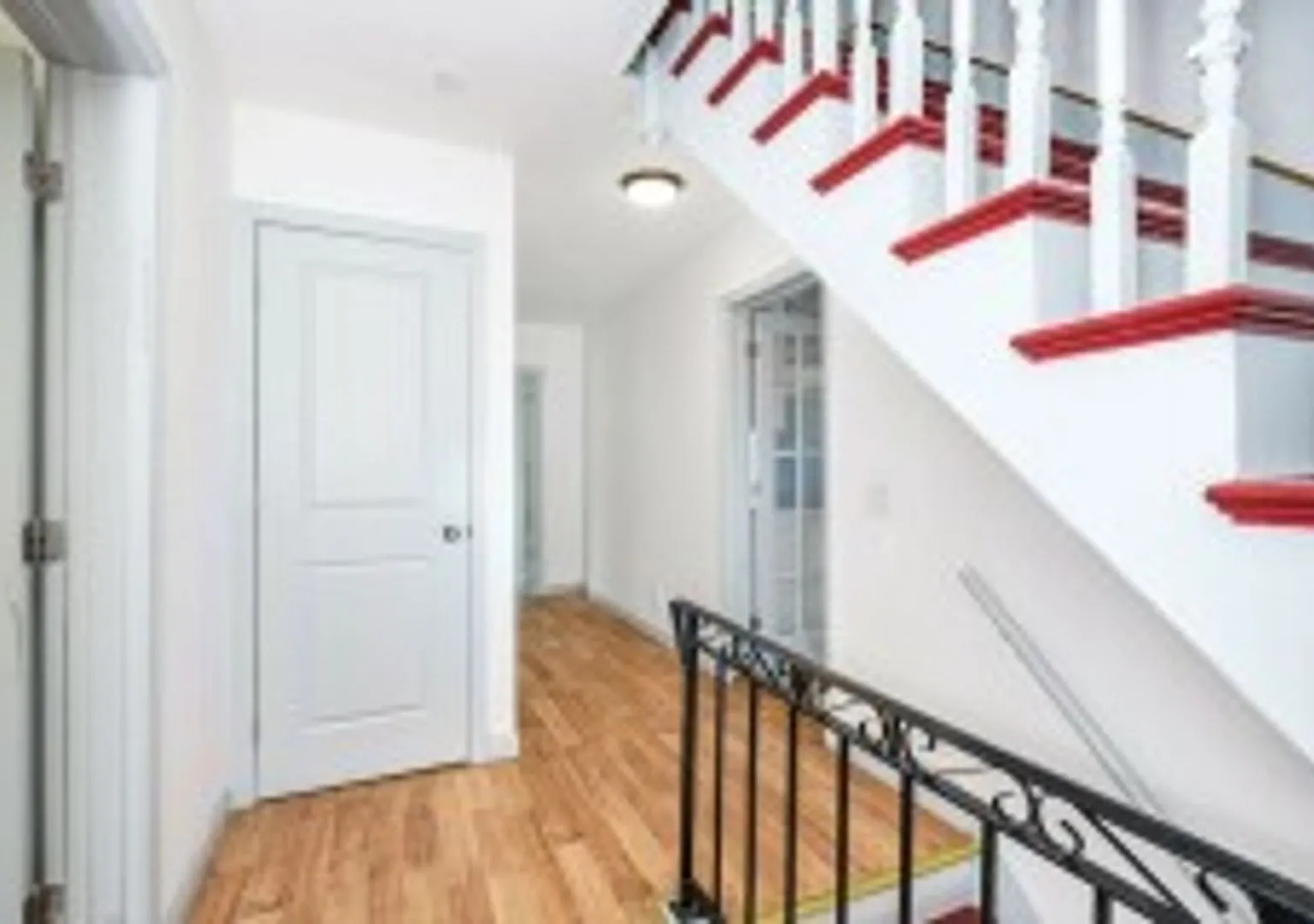 Renovated 4BR with In-Unit Laundry Near Moody Street — Photo 3
