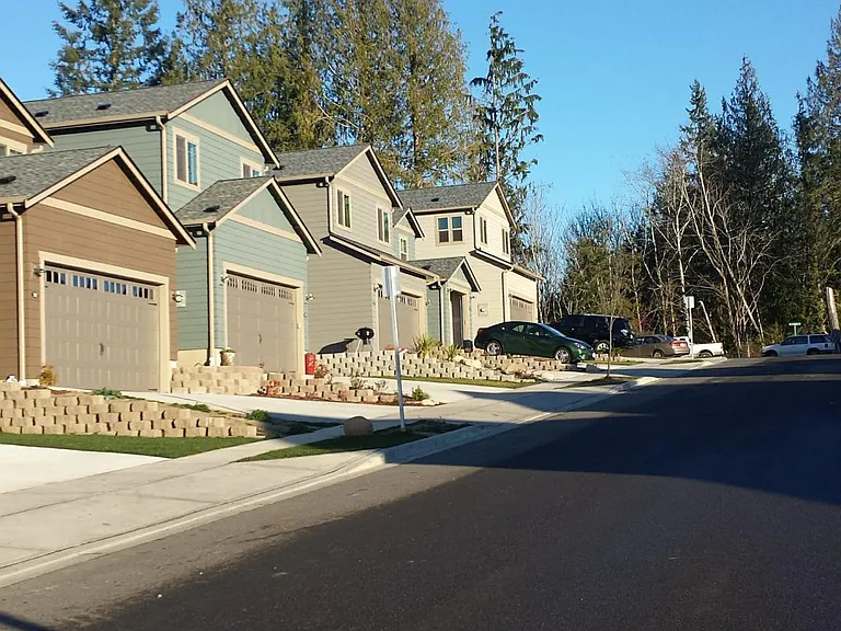 Looking up O'Henry Court towards the cul de sac, seven acre greenbelt and basketball court.