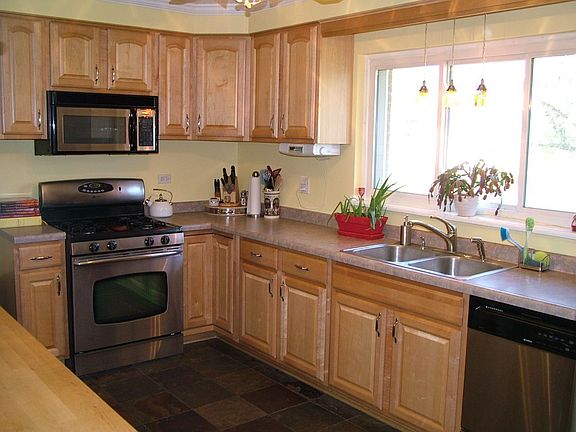 Kitchen with Slate Floor and Maple Cabinets
