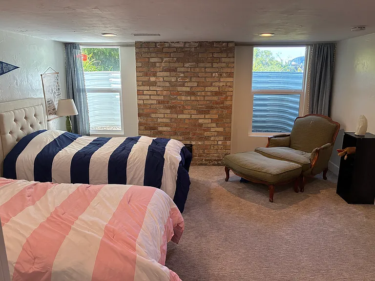 Downstairs bedroom with new large Egress Windows.