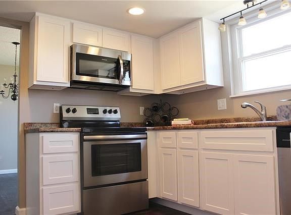 Updated kitchen with stainless steel appliances