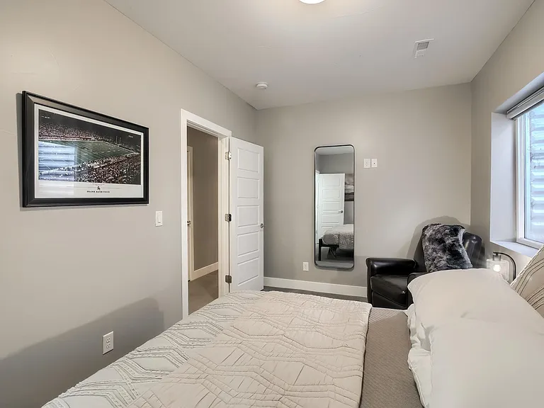 Basement bedroom queen.