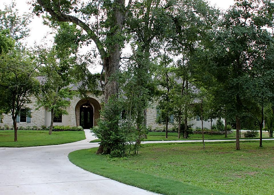 Gorgeous home on +/-1.5 acre wooded lot.