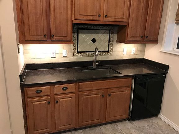 Movement sensor lights. Granite countertops.