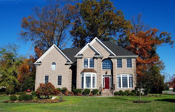Custom Built by Norman Miller Brick & Vinyl Wrapped w/ Leaf Free Gutters 