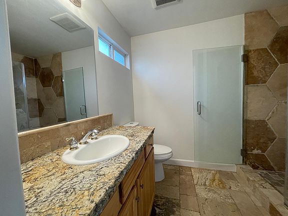 Bathroom with stall shower