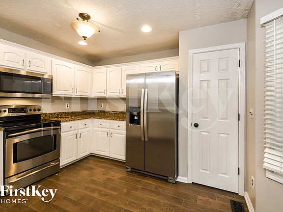 5th image of 1064 Whispering Woods Dr