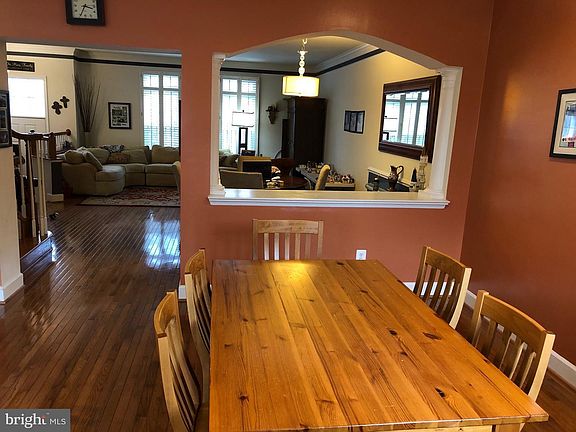 Kitchen table and view of living room