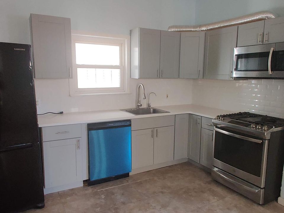 Kitchen. New cabinets, quartz countertop, new dishwasher. SS microwave and oven.
