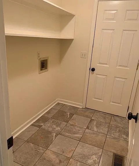Laundry Room opens into garage