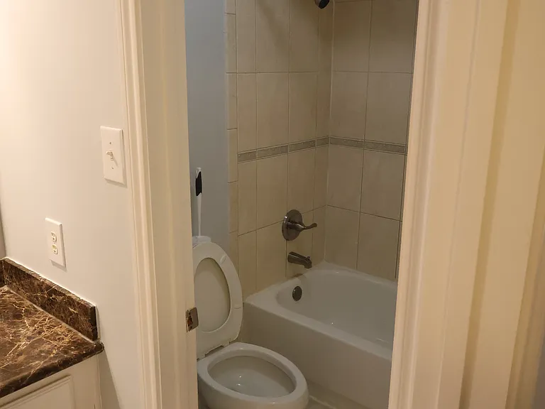 Upstairs toilet and tub/shower.