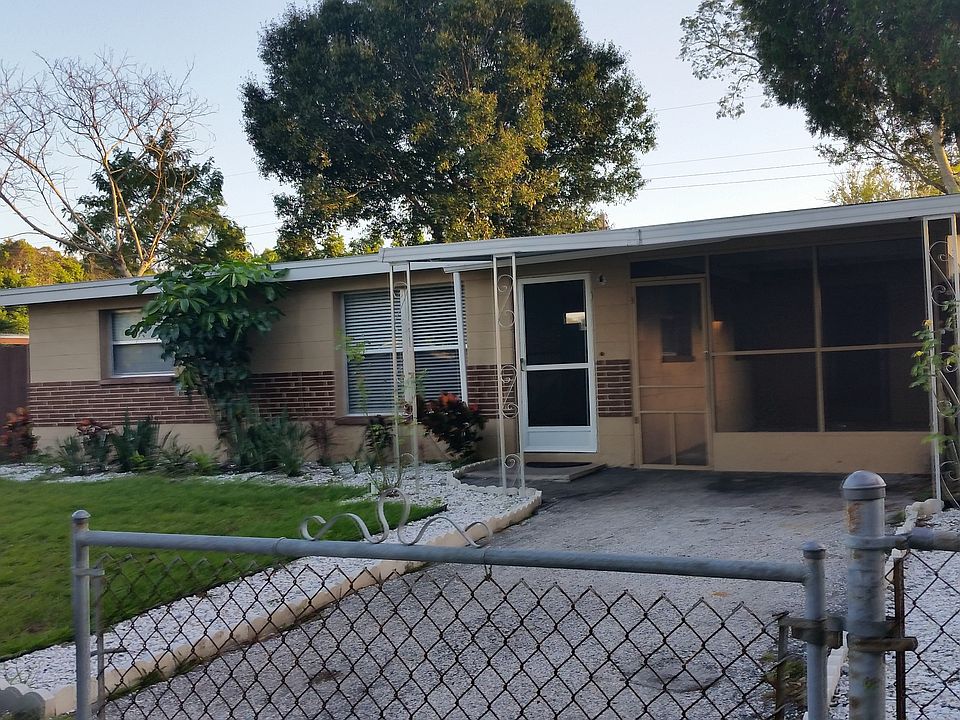 Front View, Completely fenced screened portch with utility