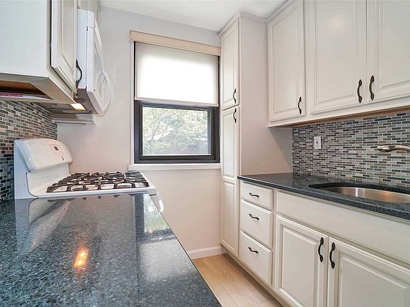 3rd image of 58-40 246th Cres