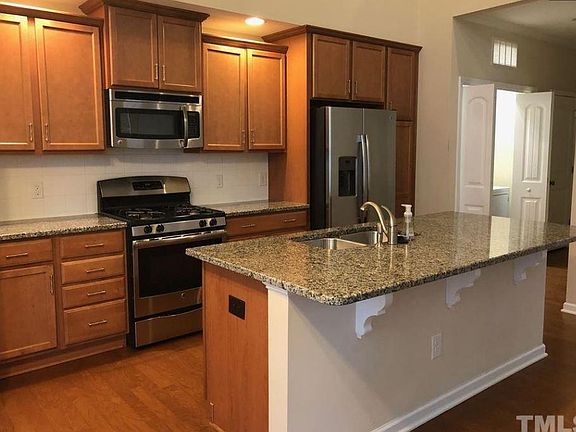 Kitchen with granite and stainless steel appliances