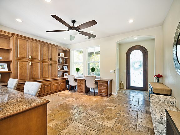 Entryway; built-in office with included chairs