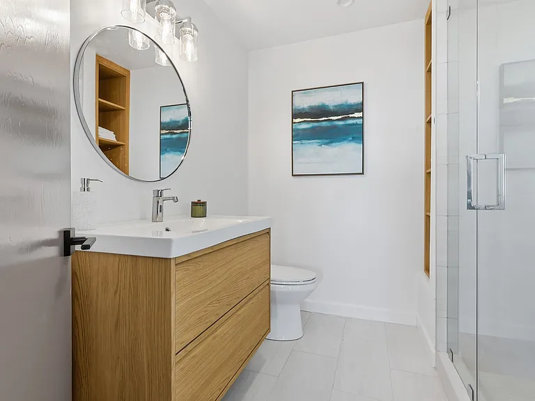 First level offers working and lounge area with full bathroom and bar.