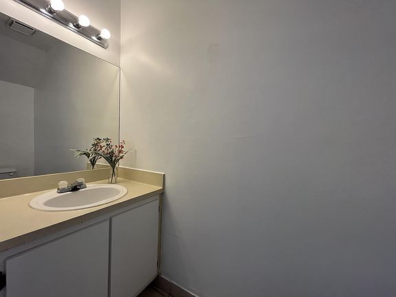 2nd image of 407 Palm Cir E #208
