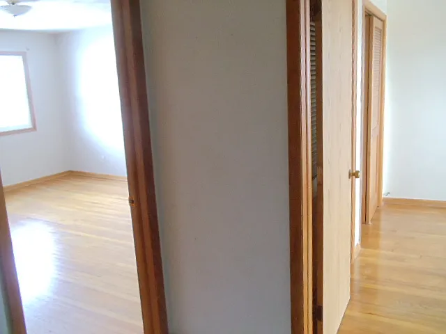PICTURE FROM UPSTAIRS HALLWAY LOOKING INTO THE TWO BEDROOMS