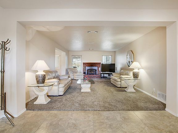 3rd image of 10500 Malaguena Ln NE