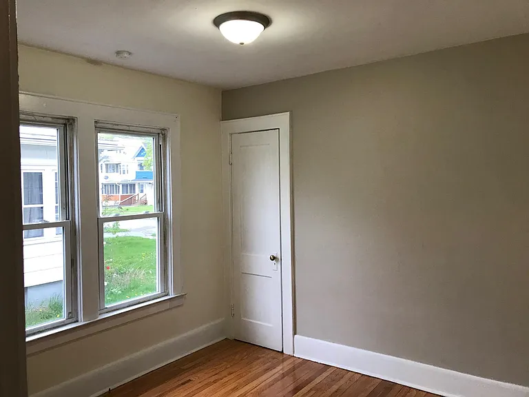 FRONT BEDROOM WITH ACCENT WALL