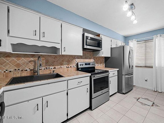 3rd image of 2137 DUNES WAY Drive W