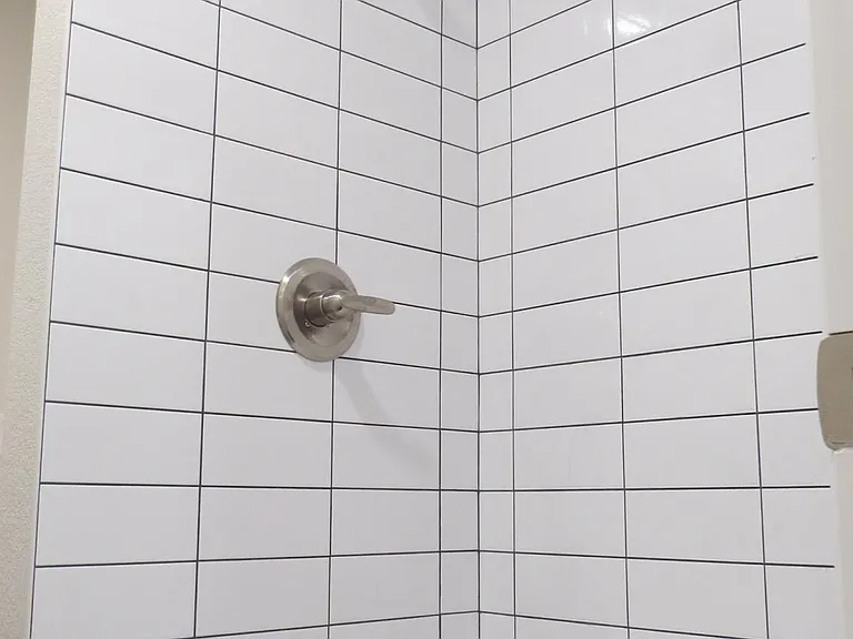 basement shower (48in wide)
