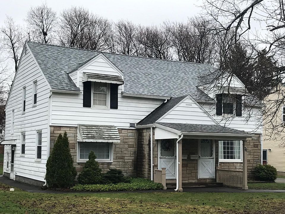 76 Oakland 2 family house located off Main Street a couple blocks from the Village of Williamsville .