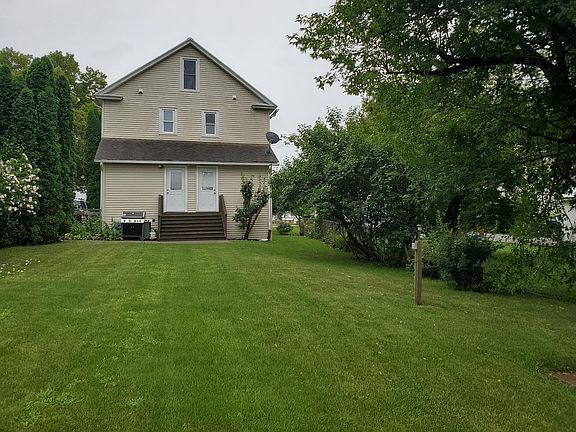 Fenced in back yard. This rental enters on the back right-side door.