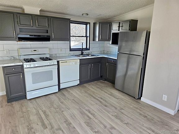 3rd image of 14470 E 13th Avenue LOT E43