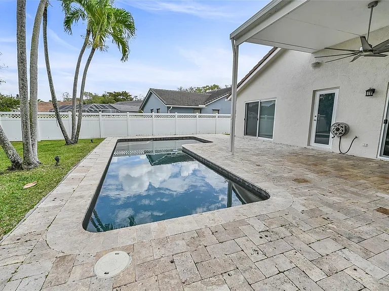 8949 NW 45th Ct — Photo 23