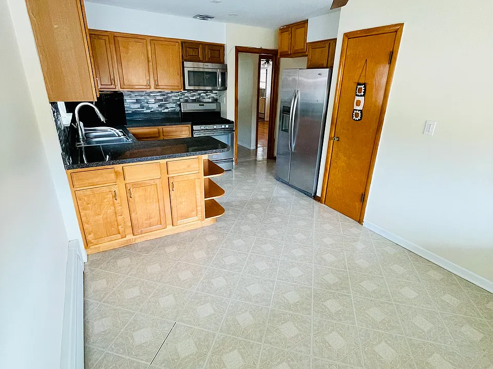 Kitchen. Microwave, gas stove, huge pantry & lots of cabinets!
