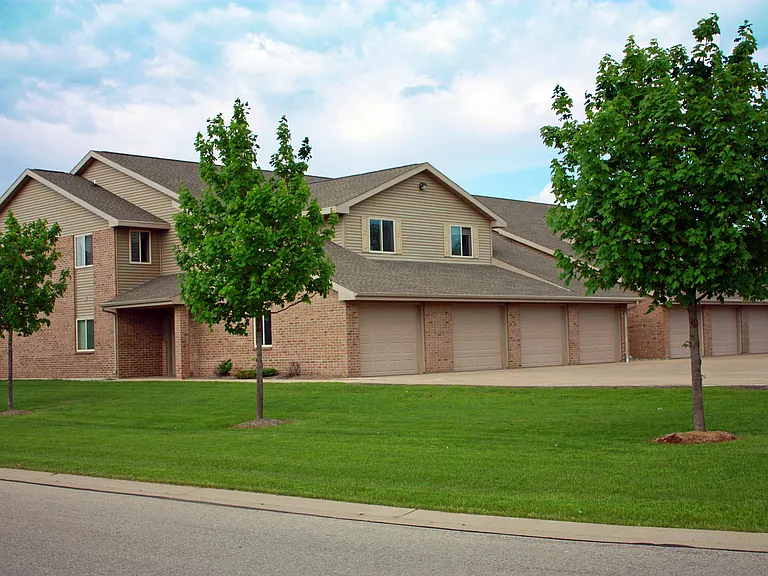 Front of building with attached garages