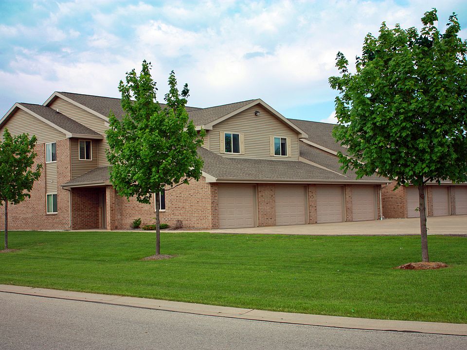 Front of building with attached garages